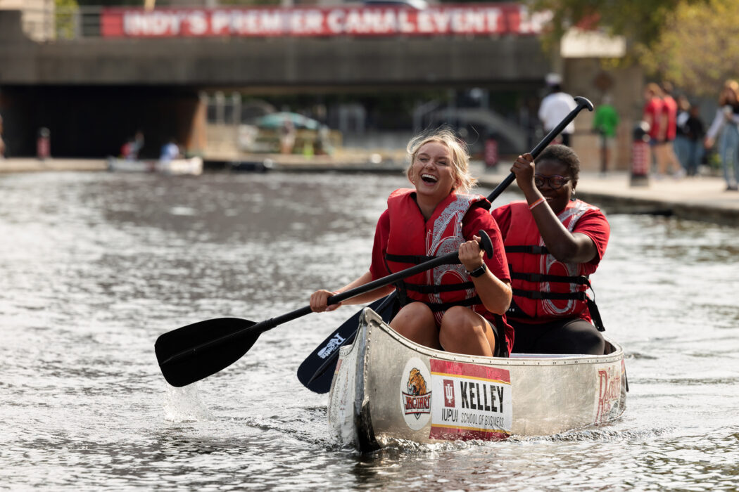 Two people in a canoe on the White River Canal